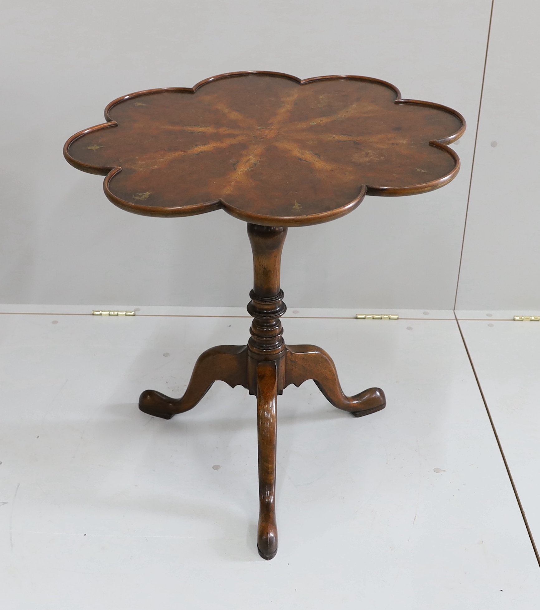 A pair of reproduction George III style mahogany and bird's eye maple tilt top tripod tea tables, width 68cm, height 69cm